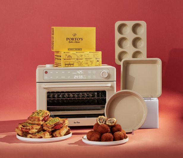 Kitchen appliance with food items and baking tools on a red background