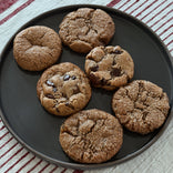 Plate of cookies on a striped tablecloth