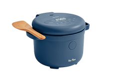 A blue electric rice cooker with a digital display and a wooden spoon resting on its handle, set against a plain white background.