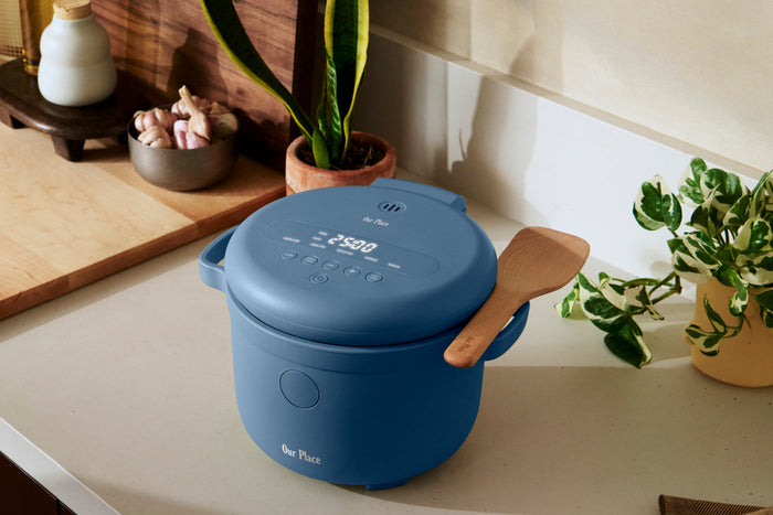 Blue Our Place Rice cooker on a counter