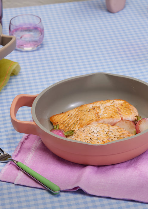 Serving salmon in a pink Mini Always Pan 