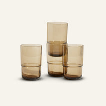 brown tall drinking glasses stacked