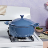 blue cast iron perfect pot on stovetop