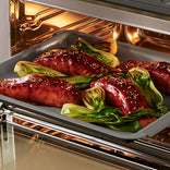 Beef and vegetable dish in an oven